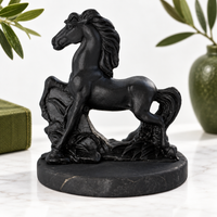 Carved shungite horse figurine, close-up