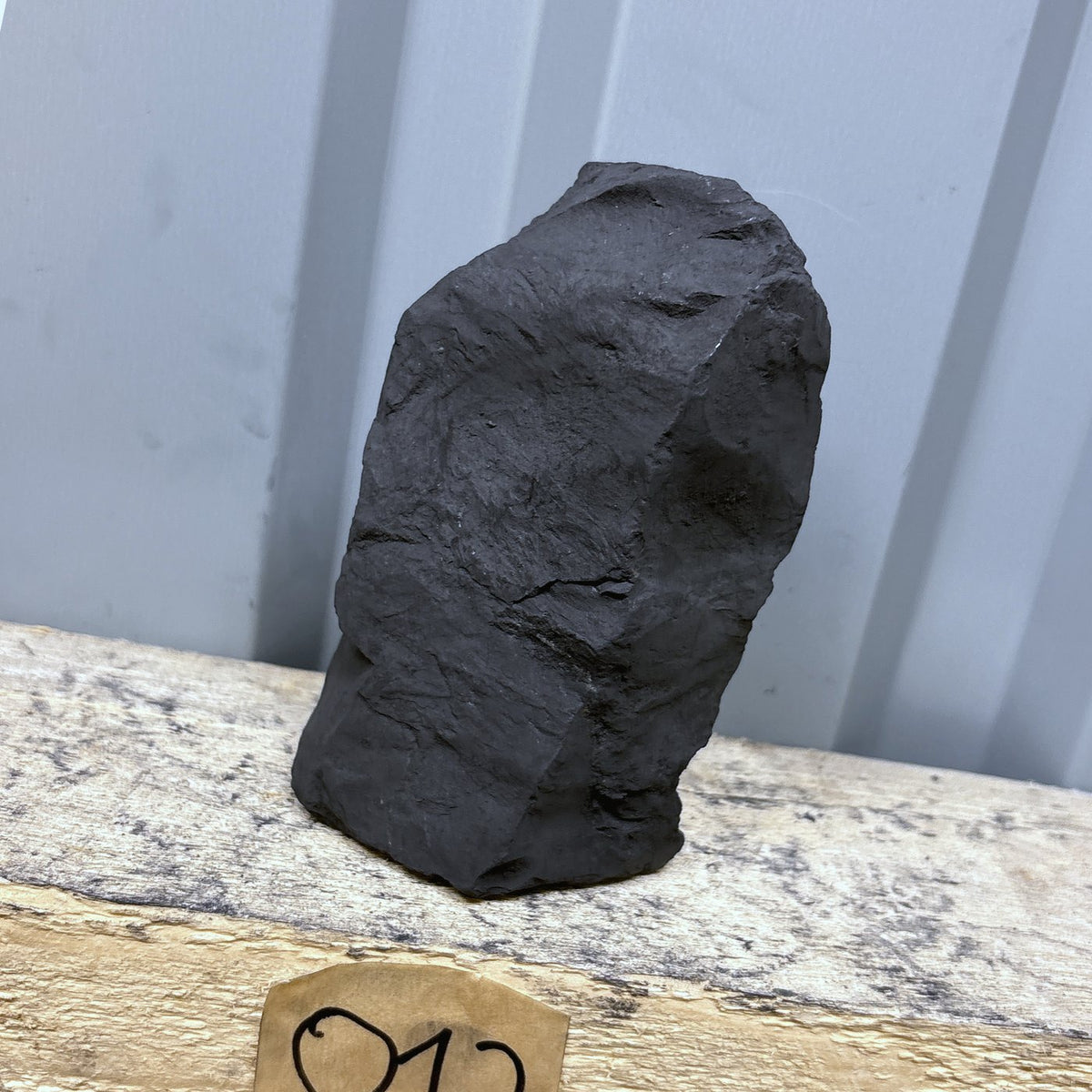 Raw shungite specimen 012, 659 g, on the shelf